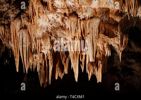 Stalactites hanging from the ceiling of the Gassel-Tropfsteinhöhle cave in Ebensee, Austria Stock Photo