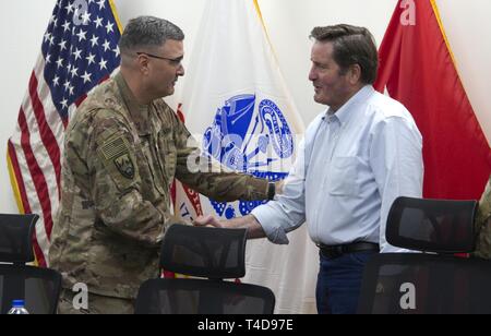 U.S. Rep. John Garamendi, a Democrat from California's 3rd District and a member of the House Armed Services Committee, greets Brig. Gen. Clint Walker, commander, 1st Theater Support Command, during a command meeting on Camp Arifjan, Kuwait, March 20, 2019. Garamendi visited the United States Central Command area of operations to speak with leaders, service members and civilians regarding readiness, collaboration with partner nations, and maximization of resources. Stock Photo