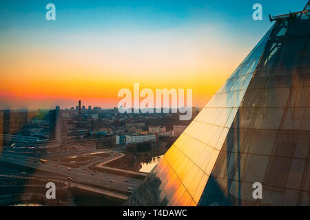 Minsk, Belarus - April 04, 2017: View Of Houses In Residential Area And Part Of National Library Of Belarus In Sunset Sunrise Time. Stock Photo