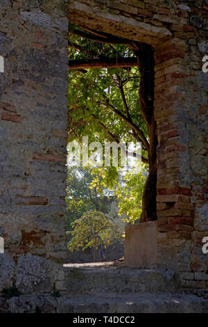 La Rocca di Montestaffoli: a doorway in the fortifications, leading to the interior, now a garden Stock Photo