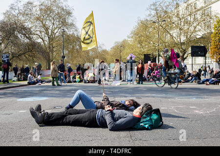 London, UK. - April 15, 2019: Members of Extinction Rebellion block roads leading to Marble Arch to promote awareness of climate change. Stock Photo