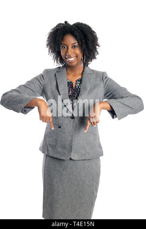 Black African American female businesswoman isolated on a white background advertising and pointing down Stock Photo