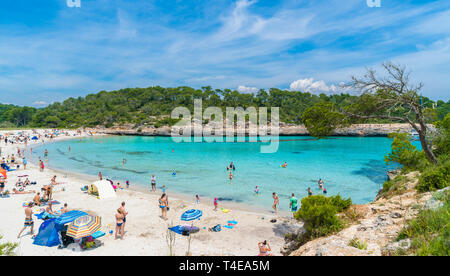 Cala Mondrago, Palma de Mallorca, Spain - May 24, 2018: Landscape with beach and turquoise sea water on Cala Mondrago, Majorca island, Spain Stock Photo