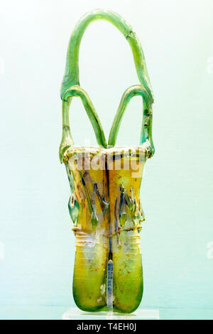 Blown glass double perfume bottle with three handles and trail decoration about AD 350 from Mt Carmel Stock Photo
