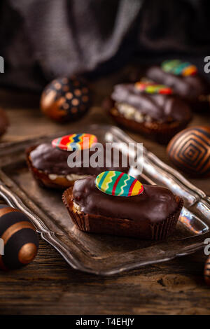 Mini chocolate cakes with Easter decoration Stock Photo