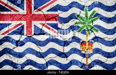 Flag of the British Indian Ocean Territory on dry earth ground texture background Stock Photo