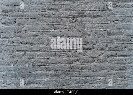 industrial gray brick wall background in Europe. May be used in design and interiors. Stock Photo
