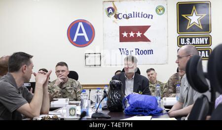 CAMP ARIFJAN, Kuwait - Colonel Christopher M. Coglianese, left, deputy ...