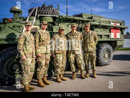 The 212th Combat Support Hospital (CSH) EFMB awardees pose with their teammates on April 2nd, 2019. Stock Photo