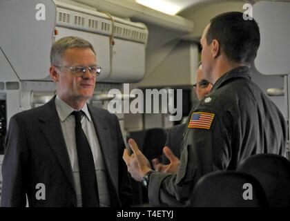 Japan (Mar. 29, 2019) — French Republic Ambassador to Japan Laurent Pic, left, speaks with Cmdr. Nathan Gammache, Patrol Squadron (VP) 47 Commanding Officer, right, during a static display tour of a P-8A Poseidon. The 'Golden Swordsmen' of VP-47 are currently deployed to Kadena Air Force Base in Okinawa, Japan conducting maritime patrol and reconnaissance and theater outreach operations within U.S. 7th Fleet (C7F) area of operations in support of Commander, Task Force 72, C7F, and U.S. Pacific Command objectives throughout the Indo-Asia Pacific region. Stock Photo