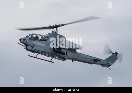 An AH-1W Super Cobra from the U.S. Marine Corps Light Attack Helicopter Squadron 773 at Joint Base McGuire-Dix-Lakehurst, N.J., performs an aerial demonstration during the Thunder Over Louisville airshow in Louisville, Ky., April 13, 2019. The Kentucky Air National Guard once again served as the base of operations for military aircraft participating in the annual event, which has grown to become one of the largest single-day air shows in North America. (U.S. Air National Guard photo by Dale Greer) Stock Photo