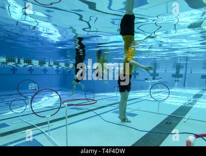 HEIGHTS, Mo. (April 6, 2019) Sailors assigned to Navy Recruiting District (NRD) St. Louis monitor submersible robots in the pool during the USS St. Louis (LCS 19) SeaPerch Competition at Pattonville High School in Maryland Heights, Mo., April 6, 2019. SeaPerch is an innovative underwater robotics program and one of the science, technology, engineering and math (STEM) programs sponsored by the Office of Naval Research, which allows students to build and operate remote-controlled submersibles through various obstacle courses. NRD St. Louis' area of responsibility covers more than 200,000 square  Stock Photo