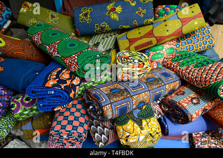 TOGO, Lome, Grande Marche, Grand market, sale of imported chinese wax print fabric for traditional afrian dress/ Grosser Markt, Marktfrauen verkaufen bedruckte Stoffe, made in china Stock Photo