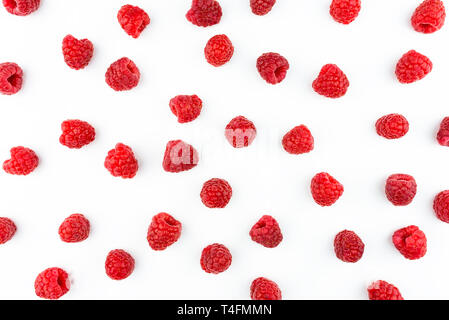 Pattern made from fresh raspberries, top view, flat lay pattern, isolated on a white background. Stock Photo