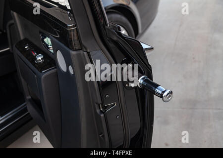 Novosibirsk, Russia - 04.11.2019: Opened doors chrome view with umbrella of a very expensive luxury Rolls Royce Phantom car, a long black limousin Stock Photo - Alamy
