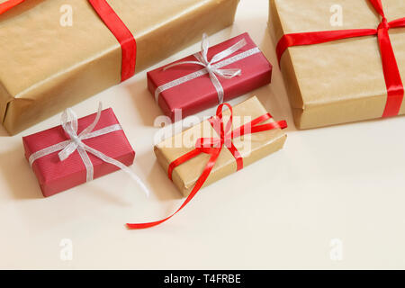 Christmas and New Year presents with the red ribbon Stock Photo