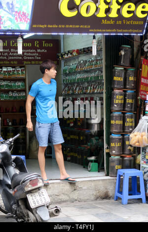Traditional Coffee seller, concentrating on roasted bean sales, Old Town, Hanoi, Vietnam Stock Photo