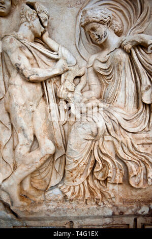 Roman temple releif freize sculpture of Aphrodite & Anchises, Aphrodisias Museum, Aphrodisias, Turkey. The trojan shepherd Anchises gazes at a seated  Stock Photo