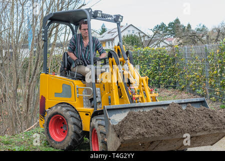 Rough earthworks using a wheel loader Stock Photo