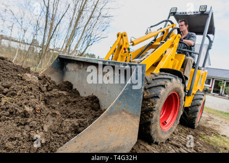 Rough earthworks using a wheel loader Stock Photo