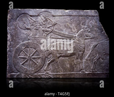 Stone relief sculptured panel of aa Assyrian Chariot. From the palace of Ashurnasirpal II  room VI/T1, Nineveh, third quarter of the 8th century BC. i Stock Photo