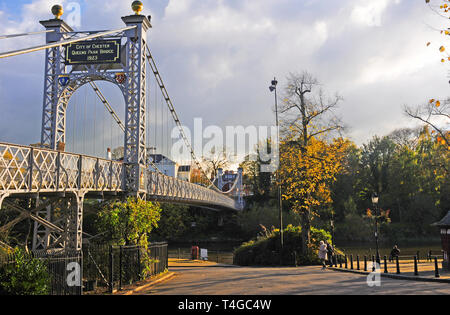 Queen's Park Pedestrian Suspension Bridge, Chester, Autumn. Spans the River Dee and links affluent suburb of Queen's Park' with The Groves. Stock Photo