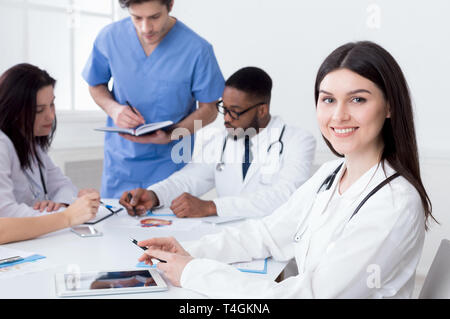 Team of doctors having meeting in medical office Stock Photo
