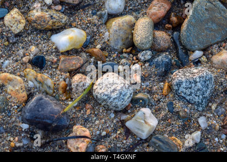 Mid-sized rocks, stones, and pebbles in various colors and shapes Stock Photo