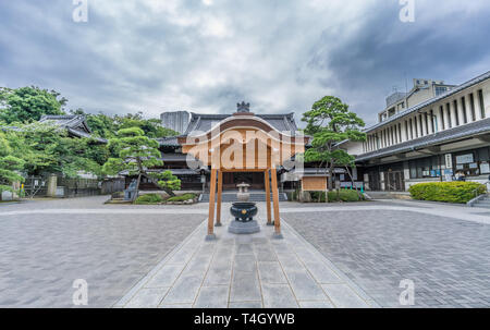 Takanawa district, Minato ward, Tokyo - August 17, 2017 - Panoramic view of Jokoro (incense burning urn) and Hondo (Main Hall) of Sengaku-ji Soto Zen  Stock Photo