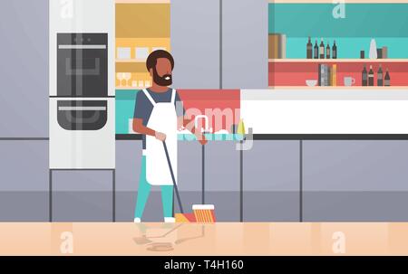 man sweeping floor with broom and scoop african american guy doing housework house cleaning concept modern kitchen interior male character full length Stock Vector