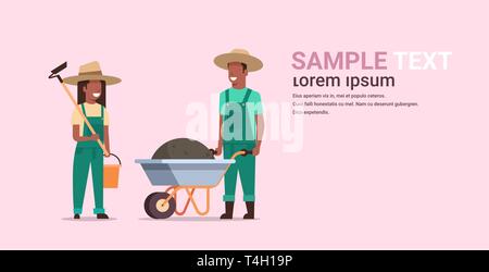 gardener man with wheelbarrow of earth woman holding hoe and bucket african american couple farmers planting flowers and vegetables gardening concept Stock Vector