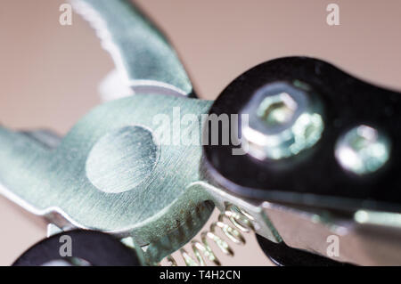 elements small foldable steel multitool, closeup, macro Stock Photo