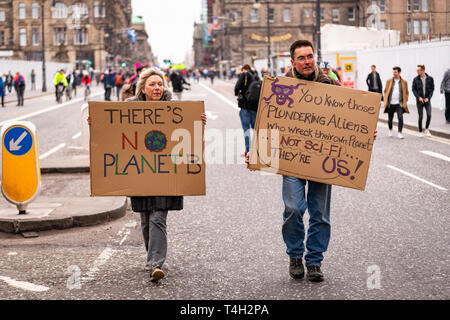 Edinburgh, UK. 16th April 2019. Protesters on North Bridge, Edinburgh, take part in the XR Climate Emergency Roadblock Demonstration. Stock Photo