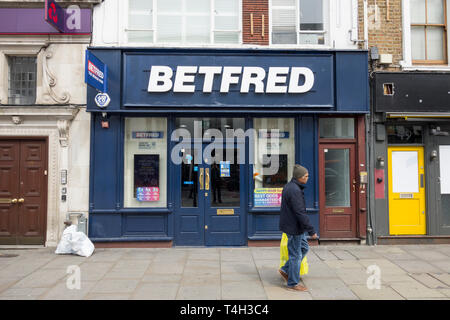 Exterior of BETFRED bookmakers betting shop in Fulham, LOndon, UK Stock Photo