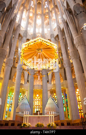 Altar and organ inside the expiatory temple of the Sagrada Familia, designed by the architect Antoni Gaudi, Barcelona, Catalonia, Spain Stock Photo