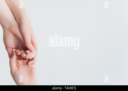 back exercise in gym with personal trainer. Stock Photo