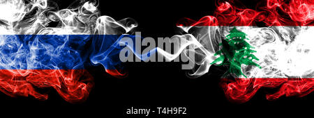 Russian vs Lebanon, Lebanese smoke flags placed side by side. Thick colored silky smoke flags of Russia and Lebanon, Lebanese Stock Photo