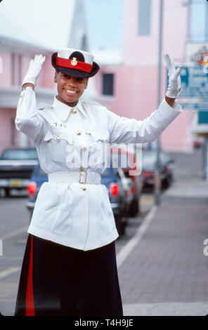 Bahamas,Bahama Islands,Atlantic Ocean,water,West Indies,New Providence,Nassau,Bay Street,woman female women,traffic patrol,warden,officer,BAH006 Stock Photo