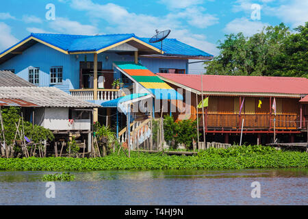 House on the river Nakhon Chai Si in Thailand Stock Photo