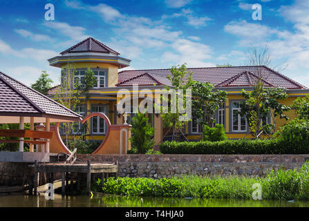 House on the river Nakhon Chai Si in Thailand Stock Photo