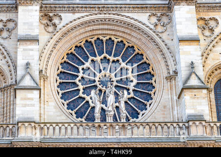 Stained glass window in facade of Notre dame cathedral.  North Rose window at Notre Dame cathedral dates from 1250 and is also 12.9 meters in diameter Stock Photo
