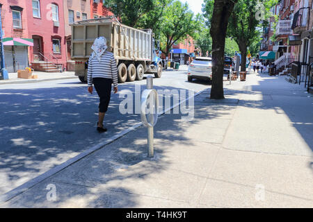 Orthodox Jewish woman Wearing Special Clothes on Shabbat, in Williamsburg, Brooklyn, New York Stock Photo