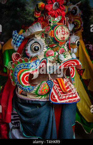 closeup head dancing dragon china.  Chinese lion dance costumes for Chinese new year. Art exposition Stock Photo