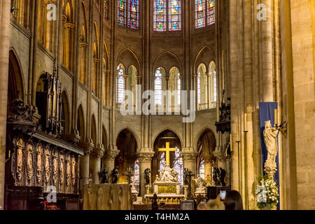 Paris, France, March 27, 2017: Interior of the Notre Dame de Paris. The cathedral of Notre Dame is one of the top tourist destinations in Paris Stock Photo