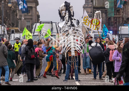 Edinburgh, Scotland. 16th April, 2019. Climate Change protestors block North Bridge in Edinburgh at rush hour. Extinction Rebellion activists were met Stock Photo