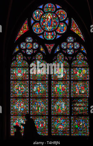 PARIS, FRANCE - APRIL 25: Stained glass window in Cathedral Notre Dame de Paris on april 25, 2011 in Paris. Stock Photo