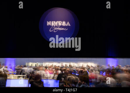 Hamburg, Germany. 17th Apr, 2019. Shareholders attend the Annual General Meeting of Beiersdorf AG in the Hamburg exhibition halls. (Long Shutter Speed Shooting) Credit: Christian Charisius/dpa/Alamy Live News Stock Photo