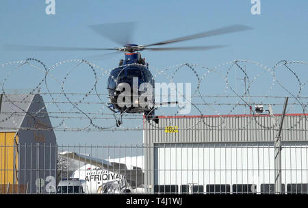 Hamburg, Germany. 17th Apr, 2019. A helicopter of the Federal Police leaves Hamburg Airport with a suspected member of the terrorist militia IS. The plane will fly the suspect to Karlsruhe, where an investigating judge at the Federal High Court will decide on the execution of the detention pending trial. Credit: Bodo Marks/dpa/Alamy Live News Stock Photo