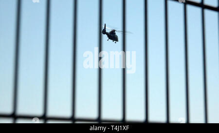 Hamburg, Germany. 17th Apr, 2019. A helicopter of the Federal Police leaves Hamburg Airport with a suspected member of the terrorist militia IS. The plane will fly the suspect to Karlsruhe, where an investigating judge at the Federal High Court will decide on the execution of the detention pending trial. Credit: Bodo Marks/dpa/Alamy Live News Stock Photo