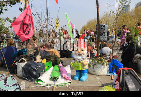 London, UK. 17th Apr, 2019. Climate activists set up a garden camp as they continue to occupy Waterloo Bridge on Day 3 of the Extension Rebellion protest blocking access to traffic as part of an ongoing protest to force the UK Government to declare a climate crisis emergency in a 2 week campaign Credit: amer ghazzal/Alamy Live News